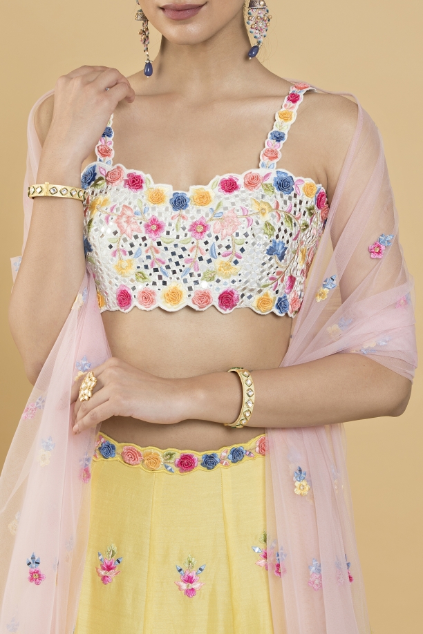 The Floral Fest Lehenga | Cutwork blouse designs, Off shoulder fashion,  Lehenga