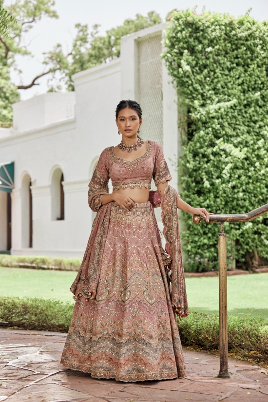 Buy SOFT PINK MULTI COLOR EMBROIDERED RUFFLE BLOUSE AND LEHENGA SET By  Designer Sanya Gulati wedding collection Noor